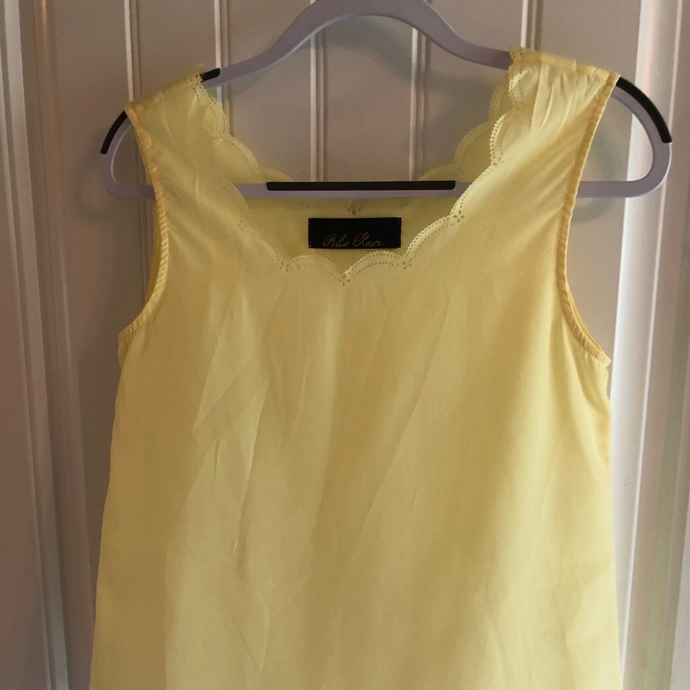 pale yellow scalloped neckline and bottom tank top